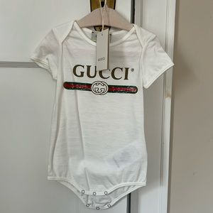 Like New GUCCI onesie with matching bib